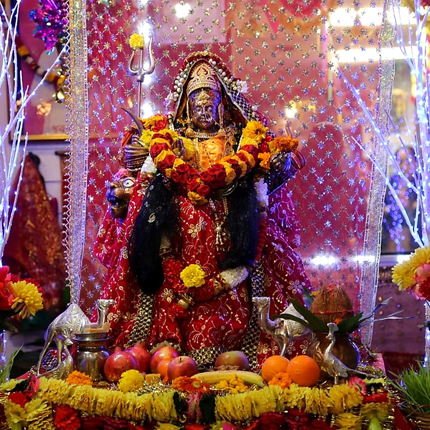 Goddess Durga mandap decorated with flowers